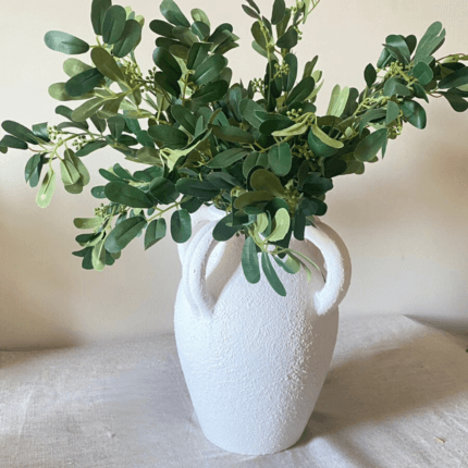 white pottery decorative vase