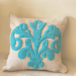 turquoise floral handcrafted cushion