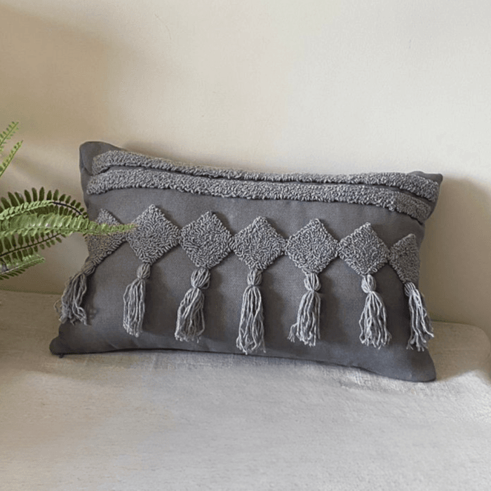 modern geometric tufted tassel cushion