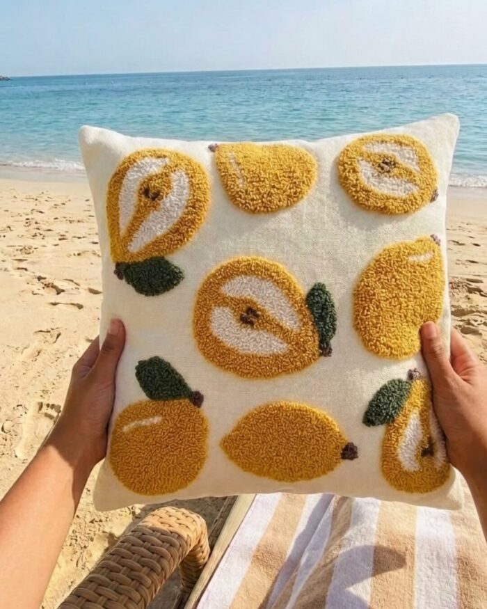 The Sun -Kissed Pear and Citrus Embroidered cushion - Image 1