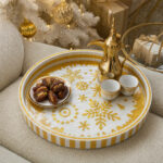 Gold Snowflakes on White round tray used for serving at home