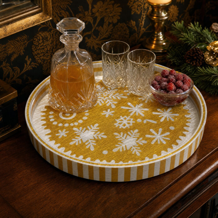 White Snowflakes on Gold round tray used for serving at home