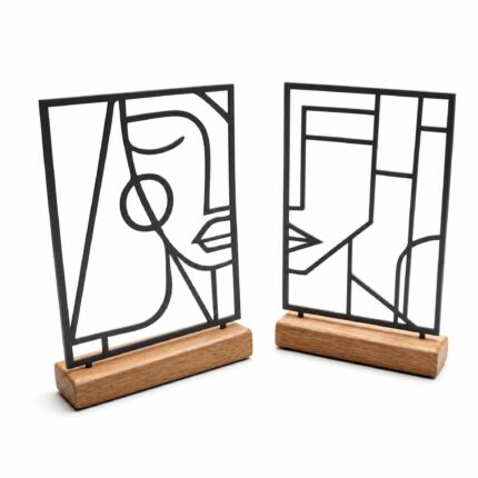Abstract Face Line Art Metal Table Sculptures on Wooden Base on a white background