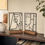 Abstract Face Line Art Metal Table Sculptures on Wooden Base in a living space