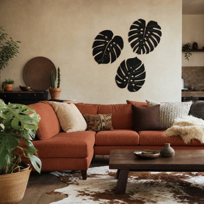Large Solid Monstera Leaves Metal Wall Art in a living space