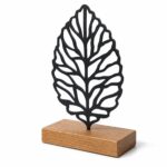Leaf Vein Metal Table Sculpture on Wooden Base on a white background