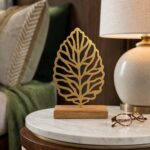 Leaf Vein Metal Table Sculpture on Wooden Base styled at home