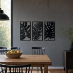 Monstera & Palm Cut-Out Metal Wall Art in a living space