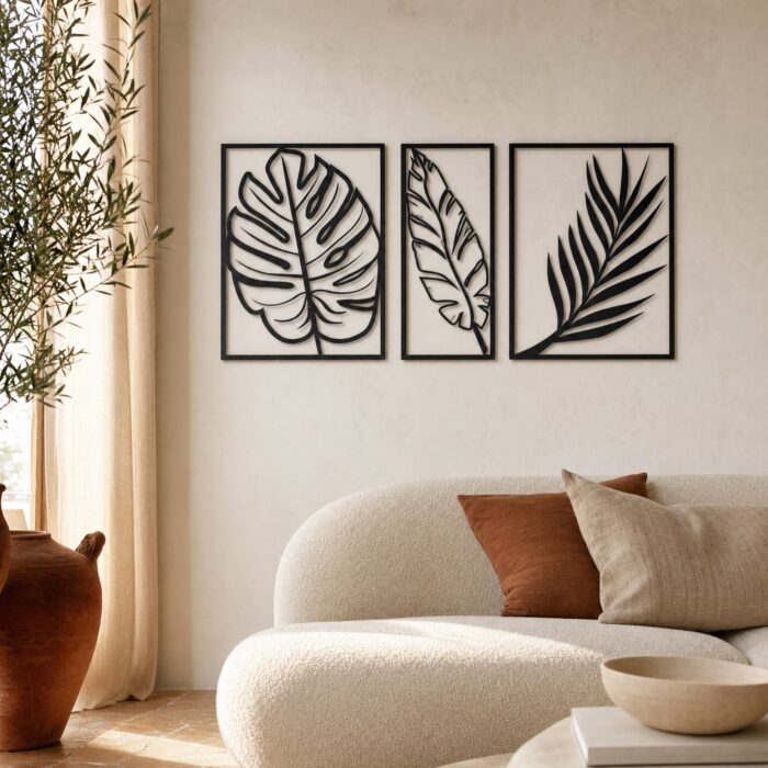 Tropical Leaf Trio Metal Wall Art in a living space